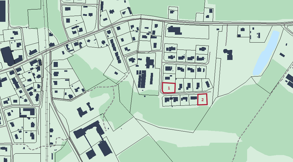 Bilden visar en kartbild över Vedum med rödmarkering var lediga tomter finns.
